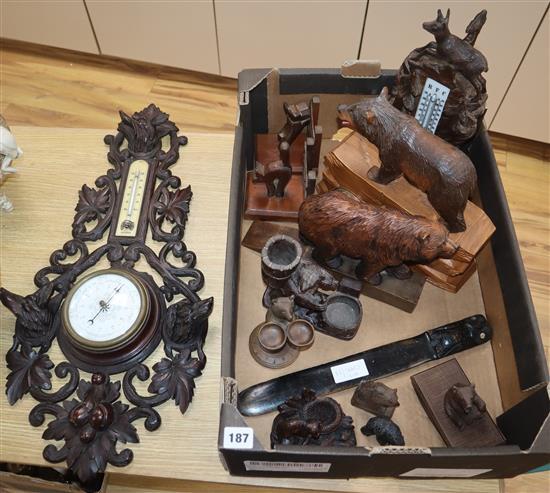 A quantity of assorted Black Forest and other wood carvings